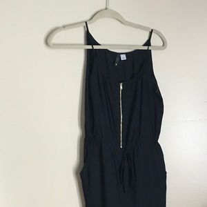 Black jumper with gold zipper